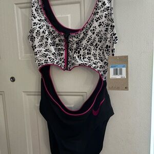 Nike Women's Black and White Sports Bra with Pink Accents
